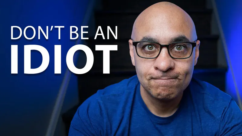 Man looking at the camera with the text: Don't Be An Idiot