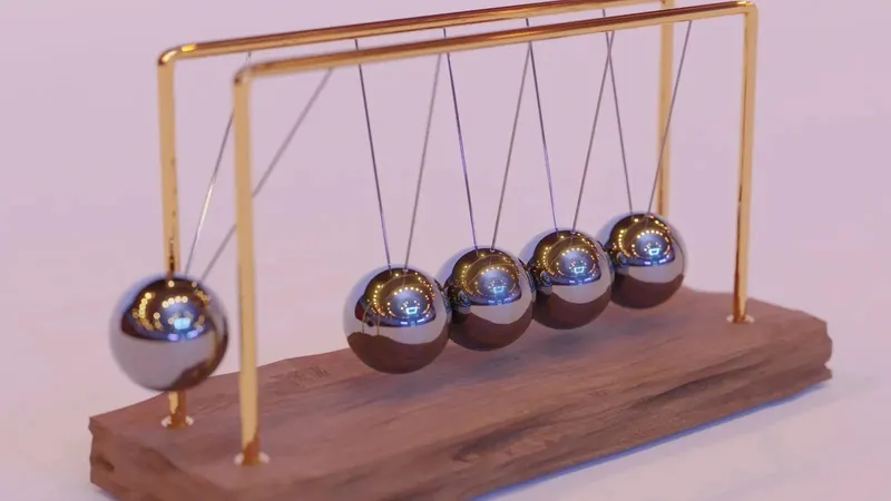 Newtons cradle in motion