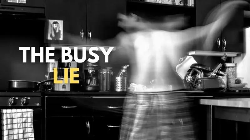 A blurred image of someone frantically working in a kitchen