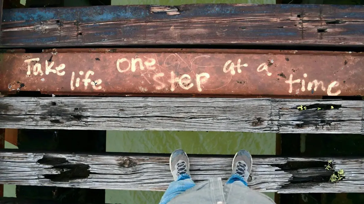 Overhead shot of stairs with the words: Take Life One Step at a Time