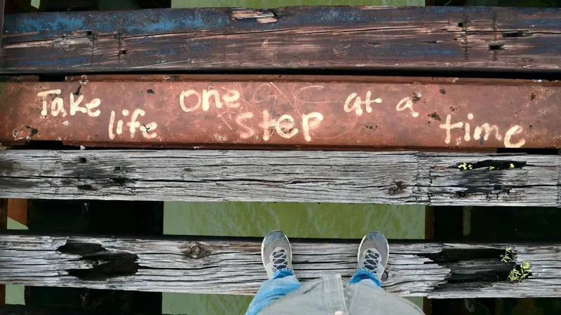 Overhead shot of stairs with the words: Take Life One Step at a Time